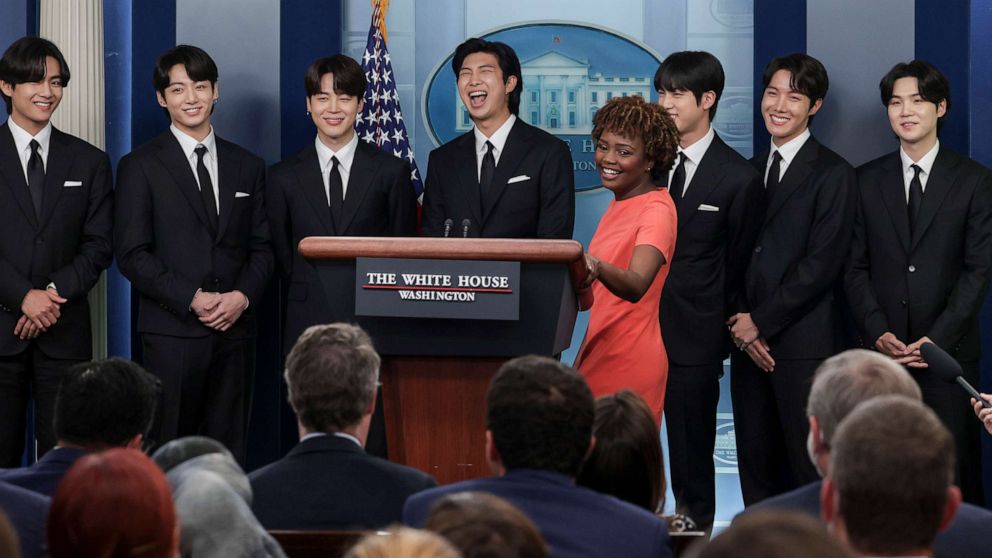 PHOTO: White House Press Secretary Karine Jean-Pierre welcomes members of the South Korean pop group BTS to the daily press briefing at the White House in Wasington, May 31, 2022.