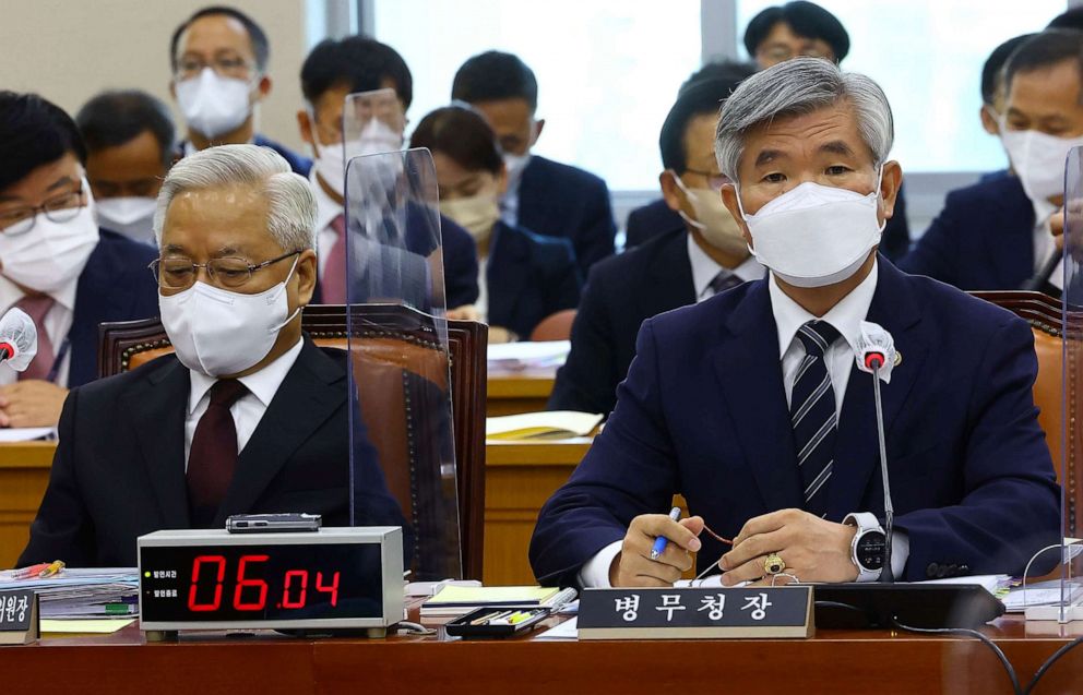 PHOTO: Lee Ki Sik, commissioner of the Military Manpower Administration, right, speaks during a parliamentary inspection in Seoul, South Korea, on Oct. 7, 2022. Lee told lawmakers that it’s “desirable” for BTS members to carry out military duties.