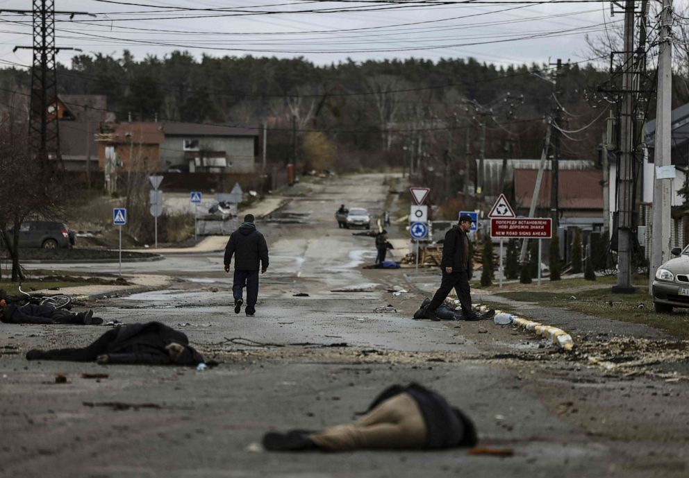 PHOTO: Bodies lie in the street in Bucha, northwest of Kyiv, in Ukraine on April 2, 2022 after Russian forces withdrew from the town.