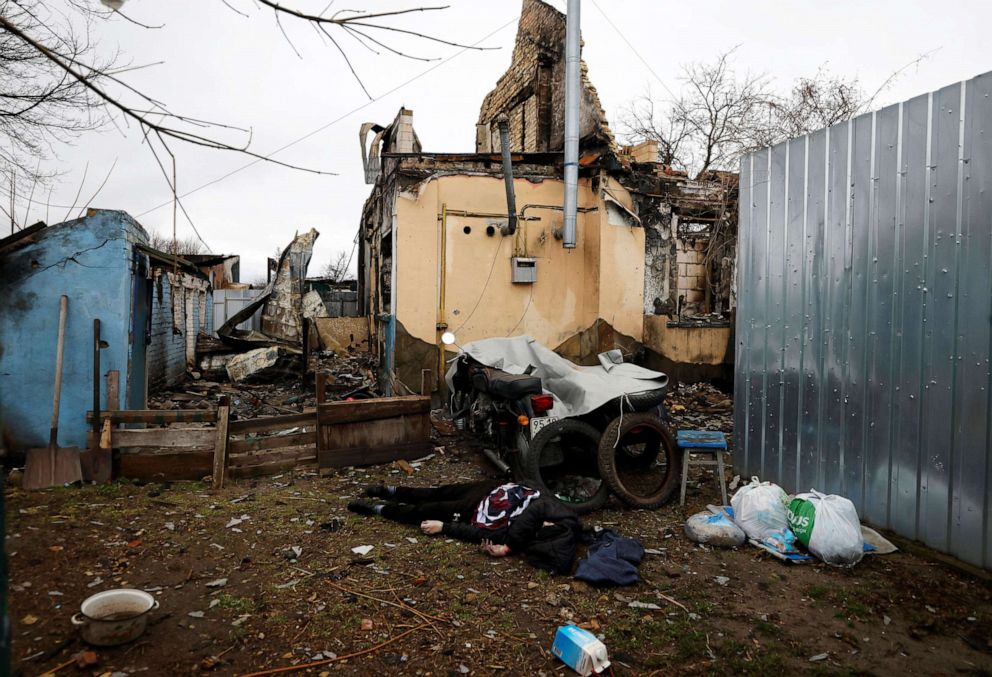 PHOTO: A body of a civilian, who according to residents was killed by Russian army soldiers, lies in the courtyard of a house, amid Russias invasion of Ukraine, in Bucha, Ukraine April 2, 2022.
