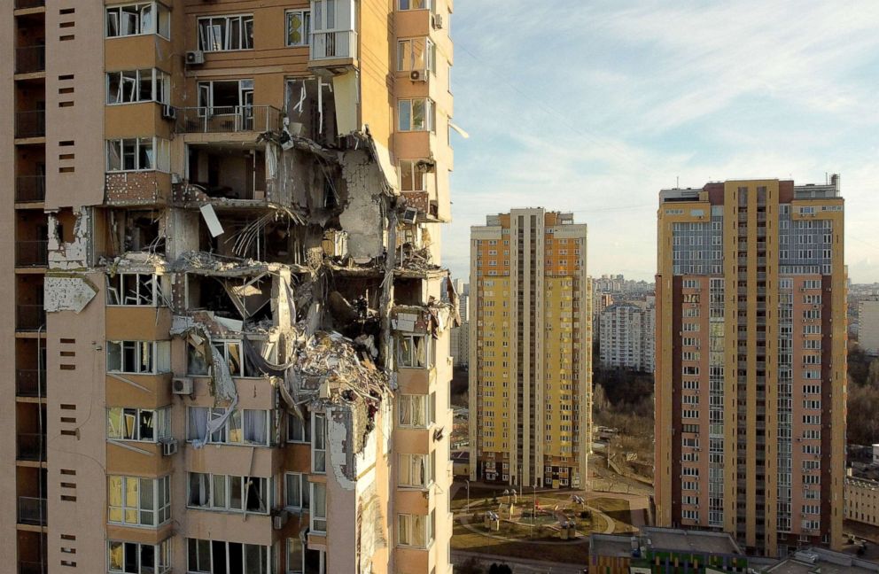 PHOTO: This general view shows damage to the upper floors of an apartment building in Kyiv on Feb. 26, 2022, after it was reportedly struck by a Russian rocket. 