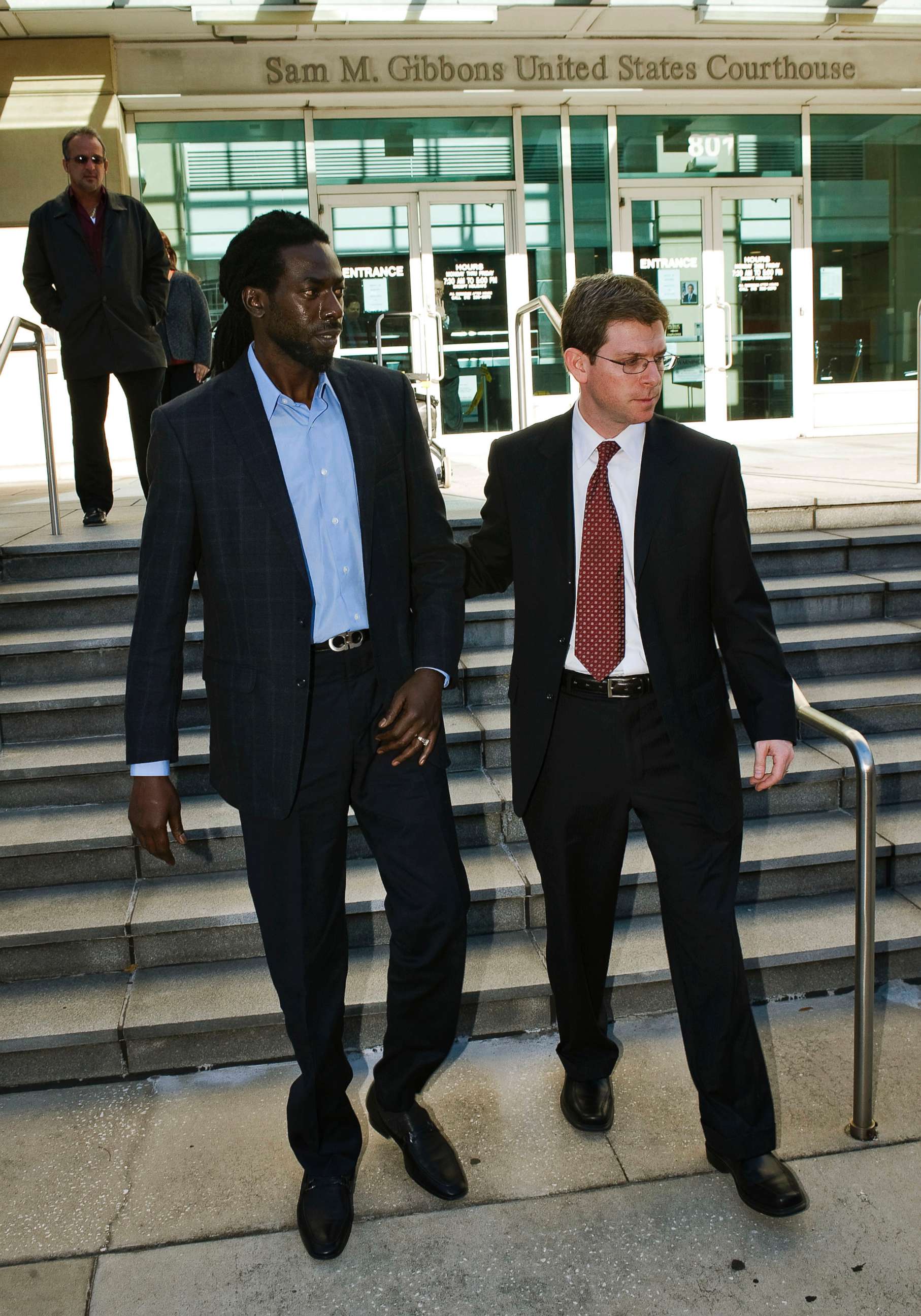 PHOTO: Grammy award winner Buju Banton of Jamaica leaves a federal courthouse with attorney David Markus in Tampa, Fla., Feb. 14, 2011.