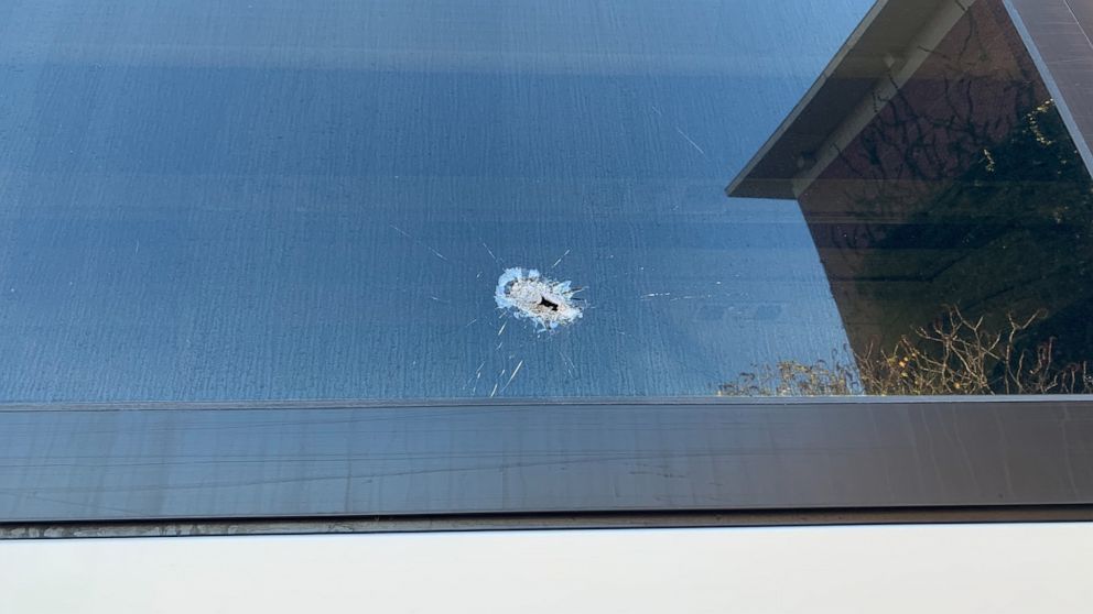 PHOTO: A bullet hole is seen on the window of a bus where a mass shooting took place, Nov. 13, 2022, at the University of Virginia in Charlottesville, Va.