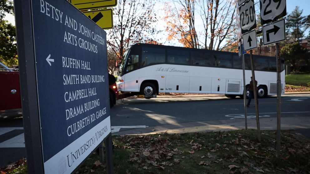 PHOTO: A tour bus where three University of Virginia football players were killed in an overnight shooting is towed away from the crime scene, Nov. 14, 2022, in Charlottesville, Va.