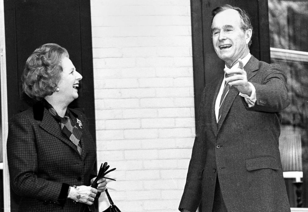 PHOTO: British Prime Minister Margaret Thatcher and U.S. Vice President George H.W. Bush pause for the media on the porch of the Vice President's residence before a breakfast meeting in Washington, D.C., Nov. 15, 1986.