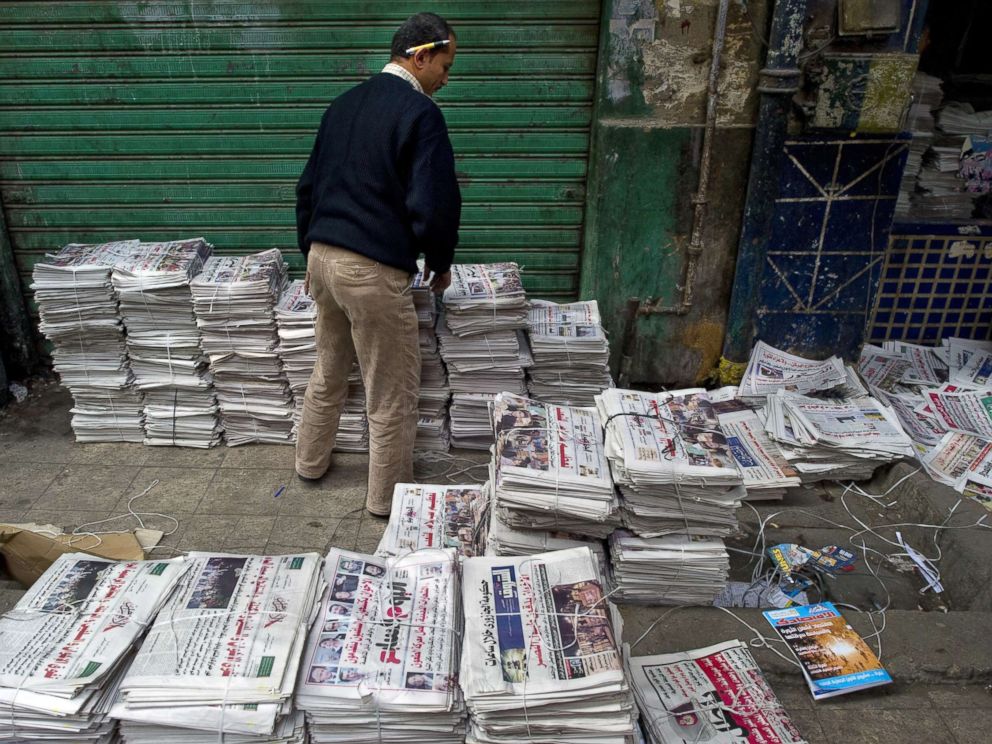 PHOTO: An Egyptian man sorts newspapers at a distribution center just off Tahrir Square in Cairo, Egypt, Dec. 2, 2011.