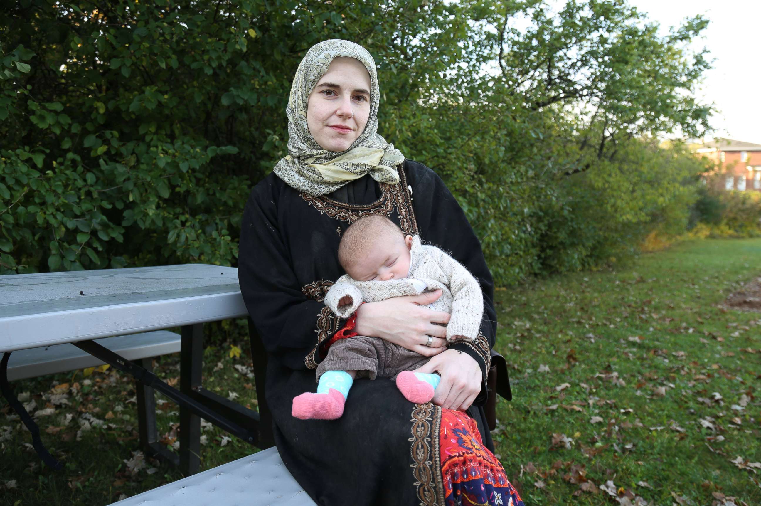 PHOTO: Caitlan Coleman, the wife  of Canadian Joshua  Boyle,  holds  her infant daughter  as she speaks  to the Star from the grounds of  a hospital  in Ottawa, Canada, Oct. 23, 2017.     