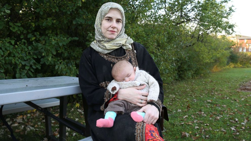 PHOTO: Caitlan Coleman, the wife of Canadian Joshua Boyle, holds her infant daughter as she speaks to the Star from the grounds of a hospital in Ottawa, Canada, Oct. 23, 2017.