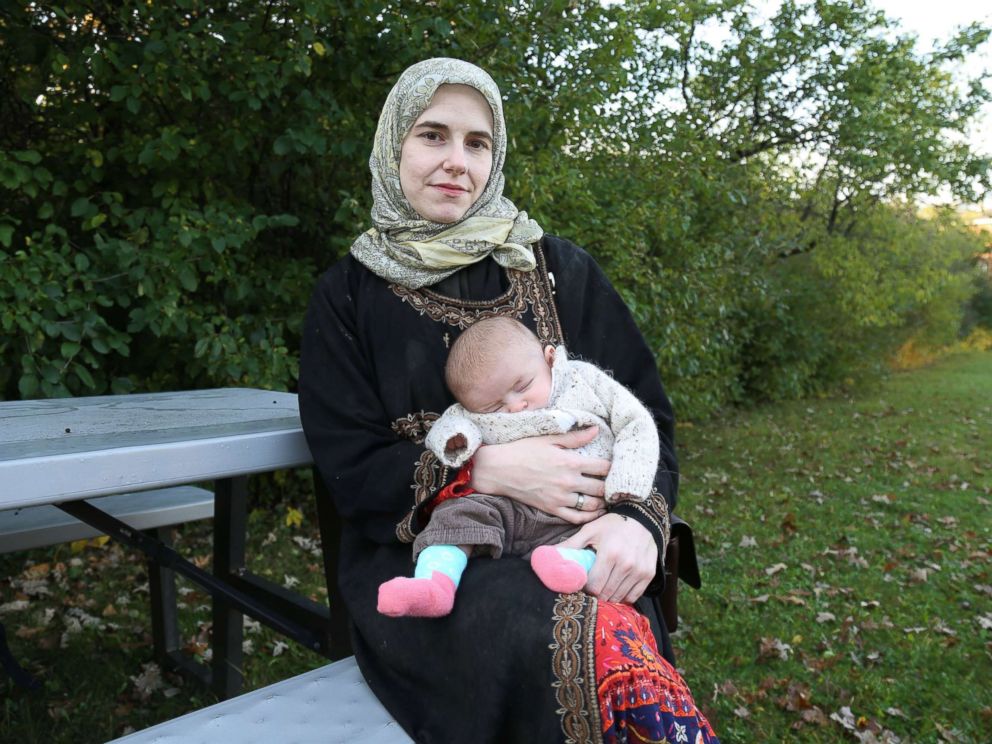 PHOTO: Caitlan Coleman, the wife of Canadian Joshua Boyle, holds her infant daughter as she speaks to the Star from the grounds of a hospital in Ottawa, Canada, Oct. 23, 2017.