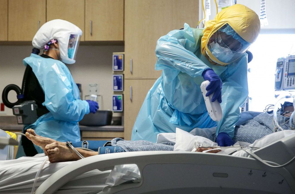 PHOTO: Clinicians care for a COVID-19 patient in the ICU at El Centro Regional Medical Center in hard-hit Imperial County on July 21, 2020, in El Centro, Calif.