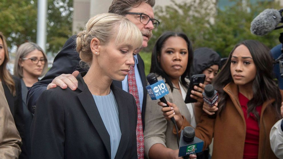 PHOTO: Surrounded by reporters, Sherri Papini arrives with her lawyer William Portanova for her sentencing hearing in downtown Sacramento, Calif,, Sept. 19, 2022.