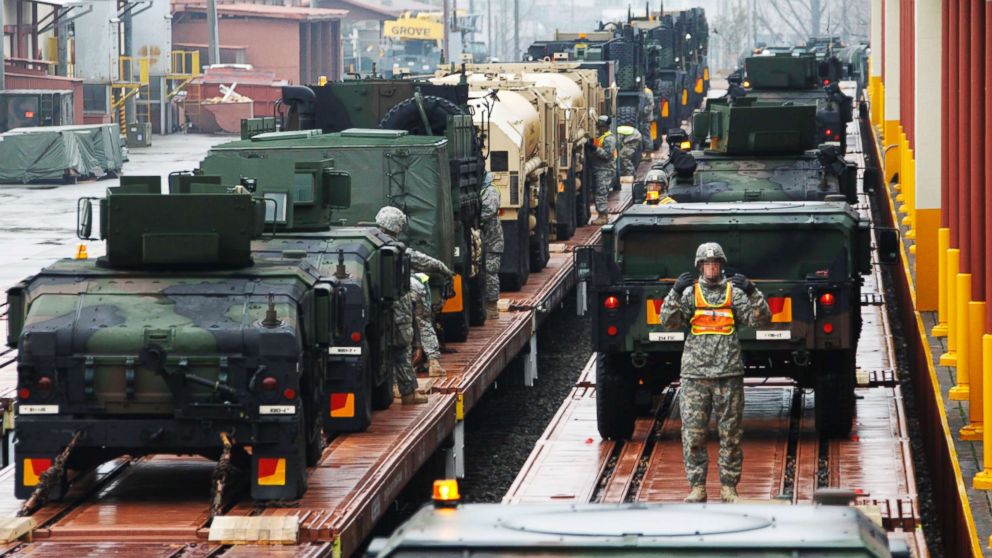 FILE PHOTO: U.S. Army soldiers load military vehicles onto trains during a U.S. Army Preposition Stocks-4 drill at Camp Carroll in Chilgok, southeast of Seoul, March 6, 2012. 
