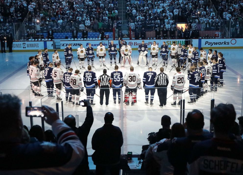 PHOTO: Winnipeg Jets and  Chicago Blackhawks players honor those involved in the Humboldt Broncos bus crash tragedy before NHL action, April 7, 2018 at Bell MTS Place in Winnipeg, Manitoba.