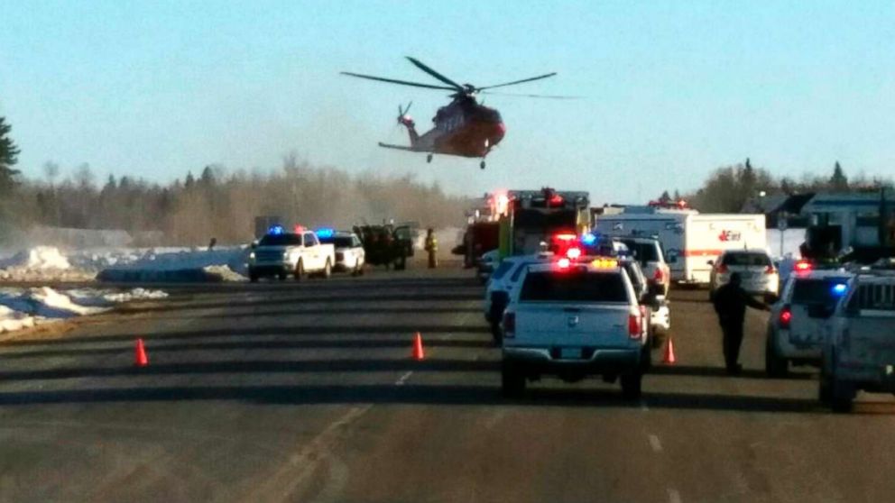 This image provided by 650 CKOM/980 CJME shows emergency crews responding to the scene where a bus carrying a junior hockey team to a playoff game was struck by a semi, April 6, 2018, north of Tisdale, Saskatchewan, Canada.