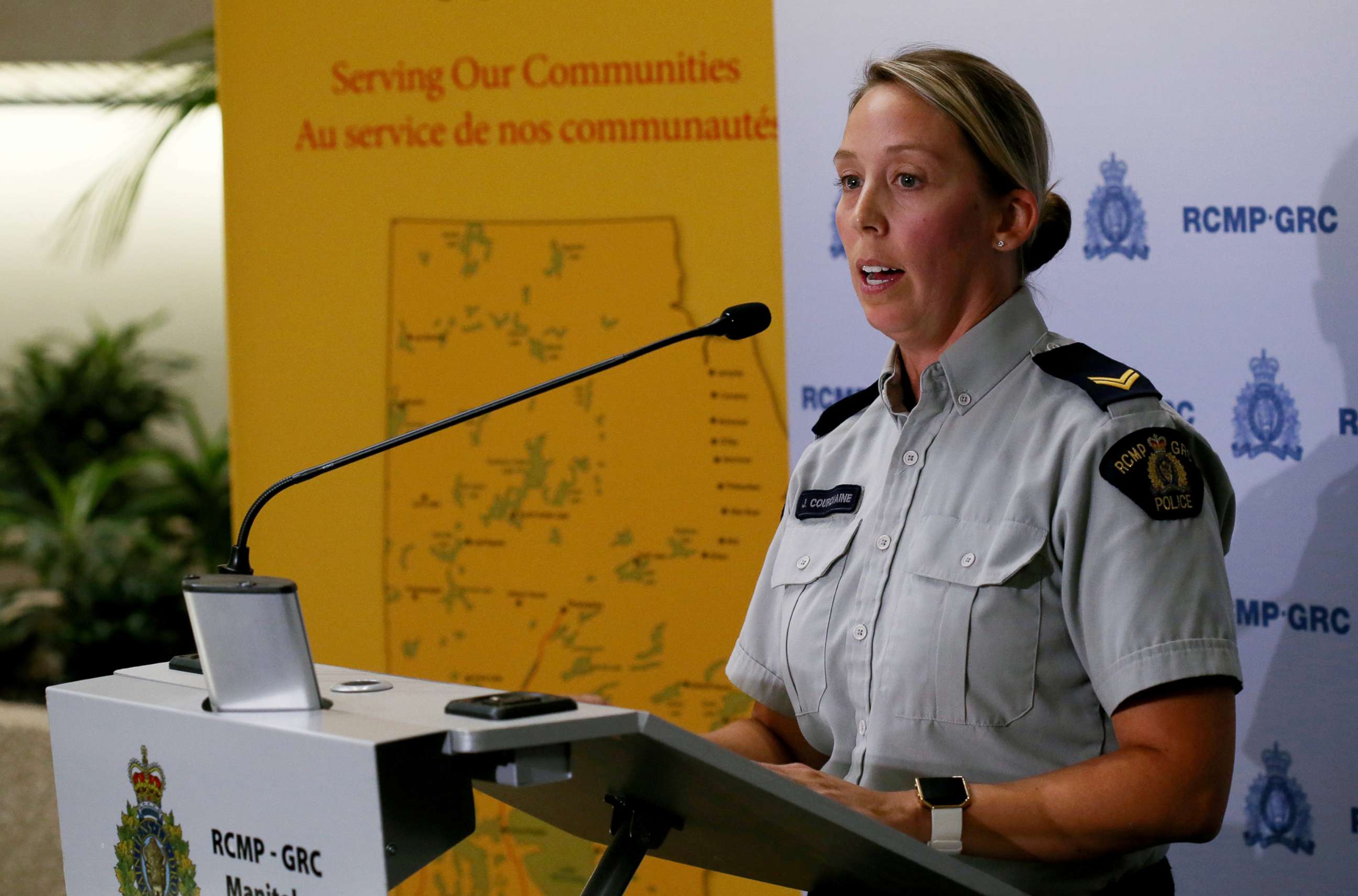 PHOTO: Cpl. Julie Courchaine, of the Royal Canadian Mounted Police, speaks to members of the media regarding the search for the suspects near Gillam, Manitoba, at the RCMP "D" Division Headquarters in Winnipeg, Manitoba Canada, July 24, 2019.