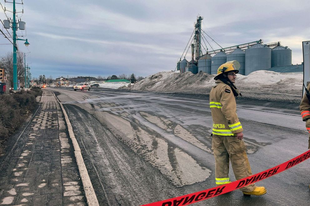 PHOTO: First responders work the scene where two men died after a pickup truck plowed into pedestrians who were walking beside a road in Amqui, Quebec, March 13, 2023.