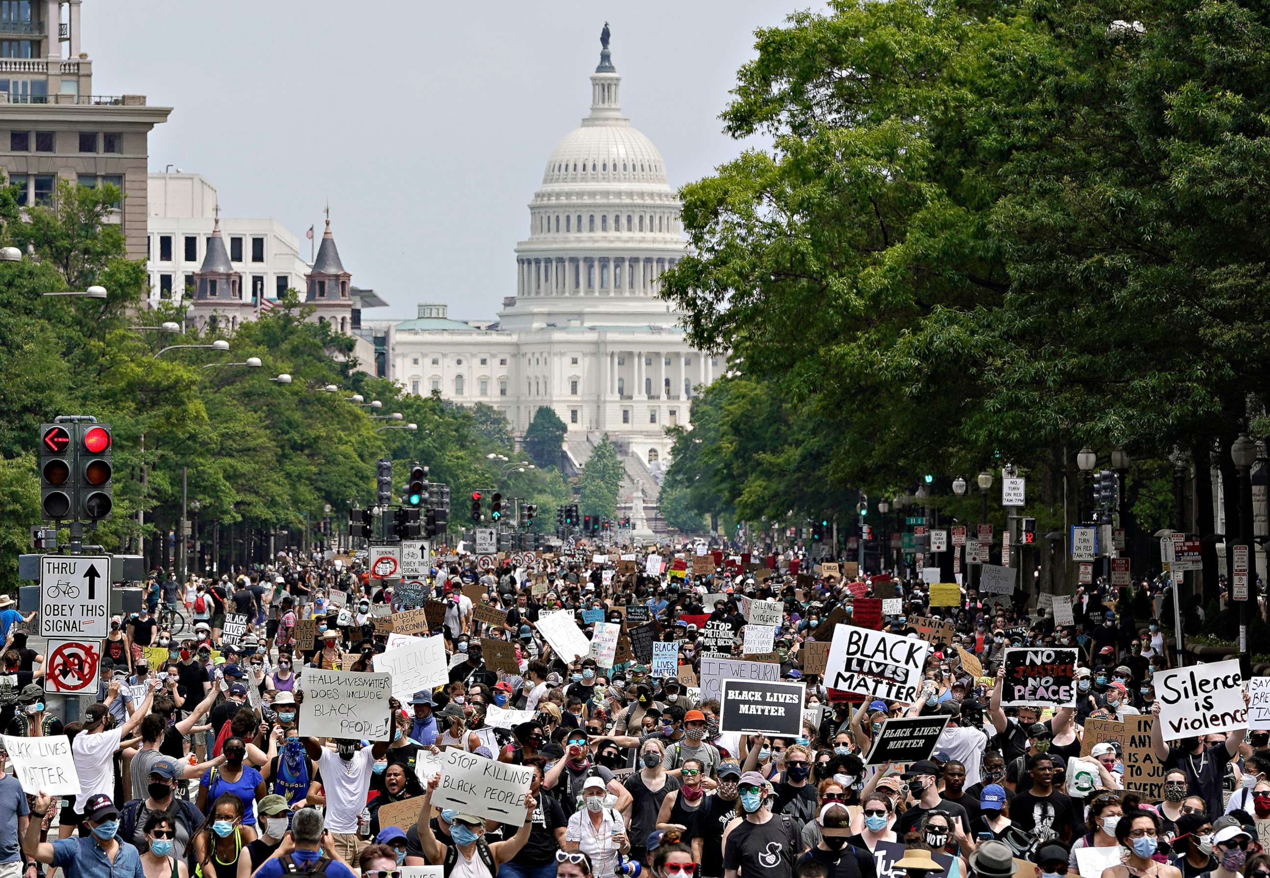 PHOTO: Demonstrators march down Pennsylvania Ave. during a protest against police brutality and racism, on June 6, 2020, in Washington.