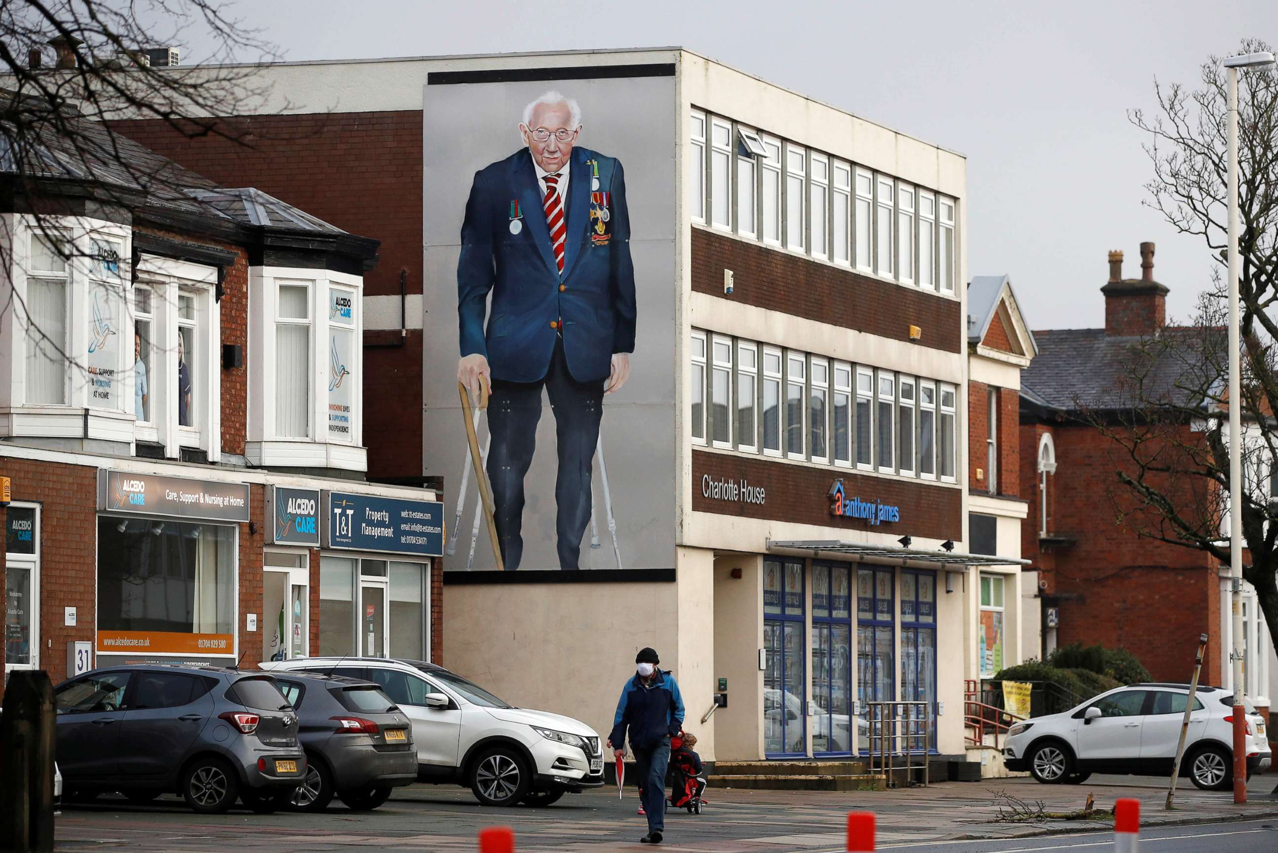 PHOTO: A mural of Captain Sir Tom Moore is seen on a building in Southport, Britain, Feb. 3, 2021.