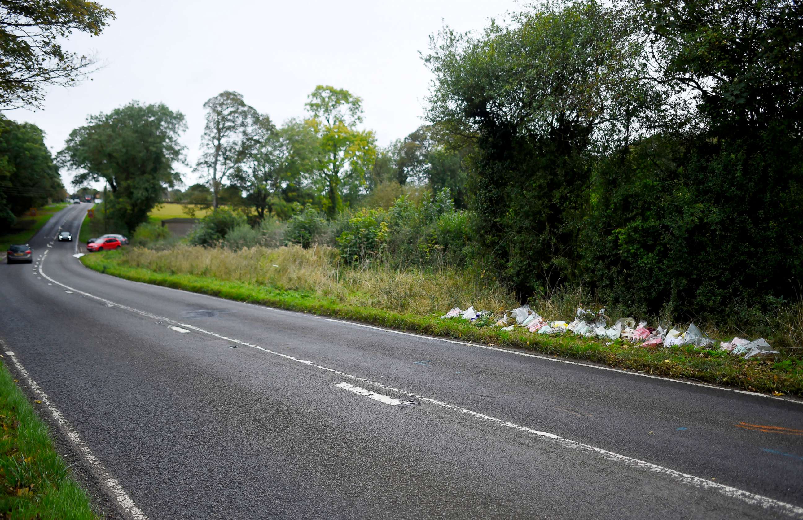 PHOTO:  A general view of flowers left in remembrance of Harry Dunn on the B4031 near RAF Croughton on Oct. 7, 2019 near Brackley, England.