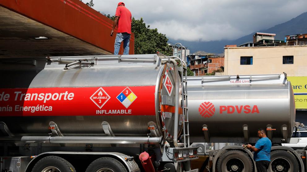 PHOTO: Fuel tanker trucks unload fuel at a gas station in Caracas, Venezuela, Jan. 7, 2026.