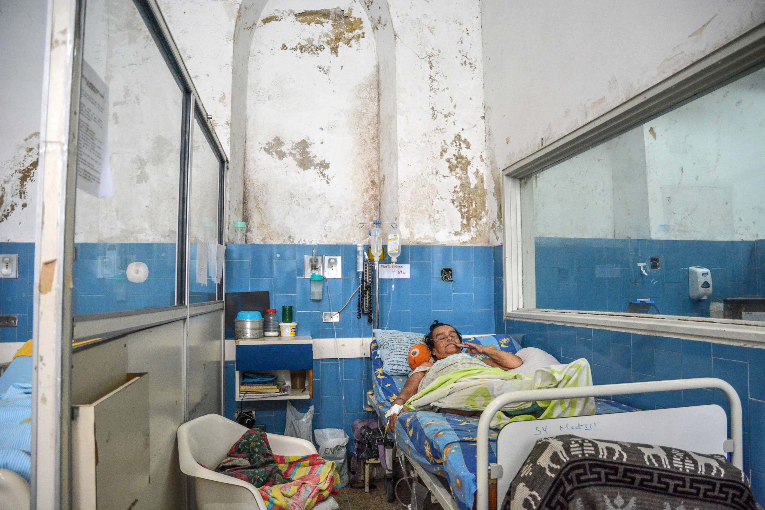 PHOTO: A patient seen lying down on her bed in a dismal hospital condition, May 10, 2018, in Caracas, Miranda, Venezuela.