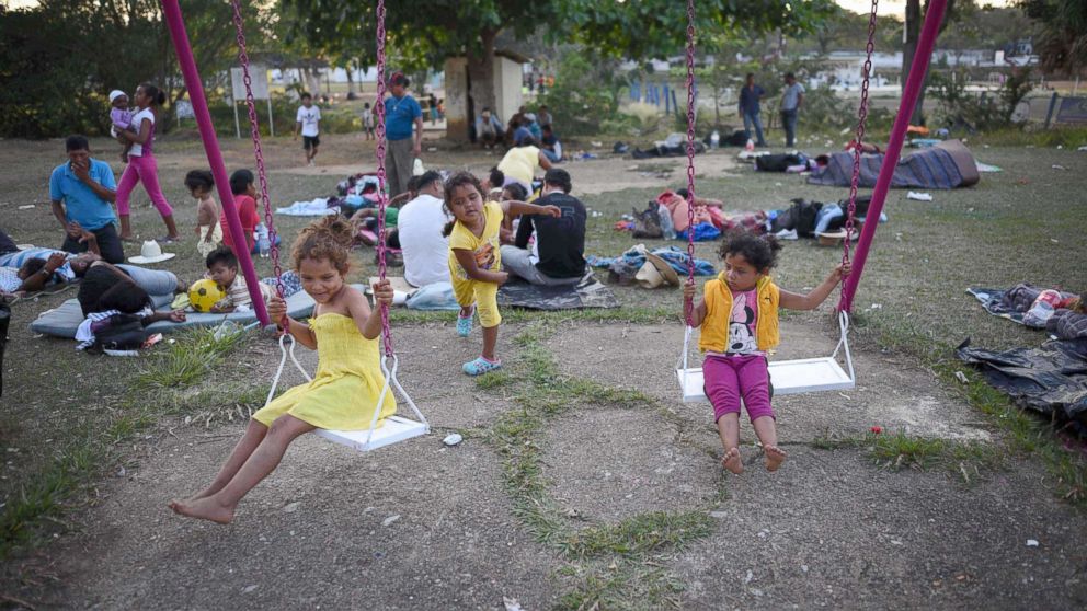 PHOTO: Central American children taking part in a caravan called "Migrant Viacrucis" play at a sports center field in Matias Romero, Oaxaca state, Mexico, April 2, 2018.