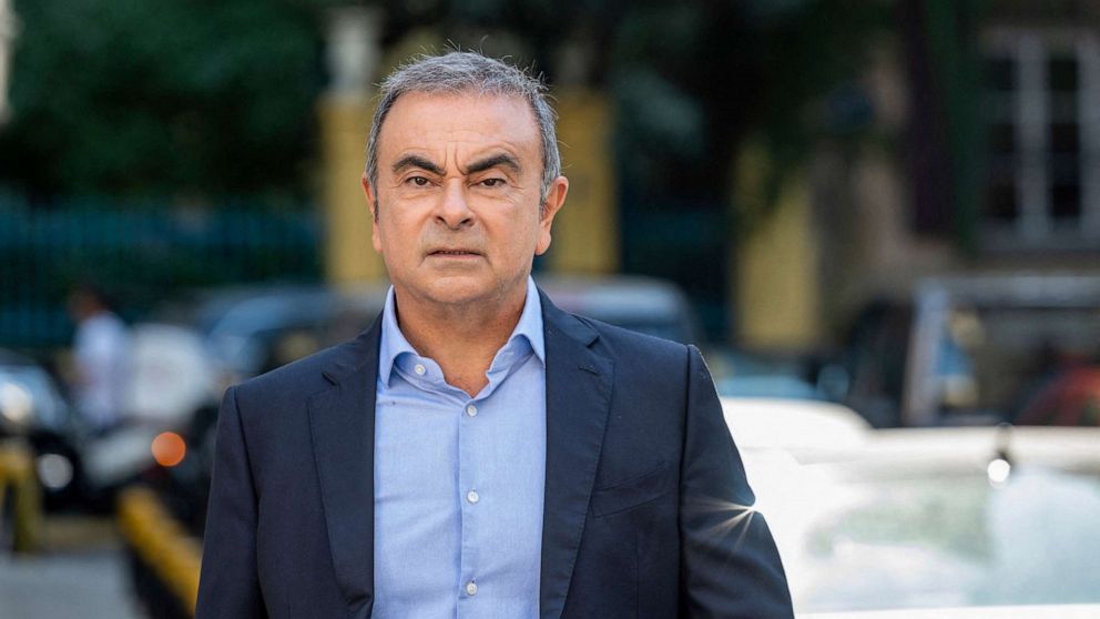 PHOTO: Former Renault Nissan CEO Carlos Ghosn walks near his house, Oct. 22, 2020, in Beirut, Lebanon.