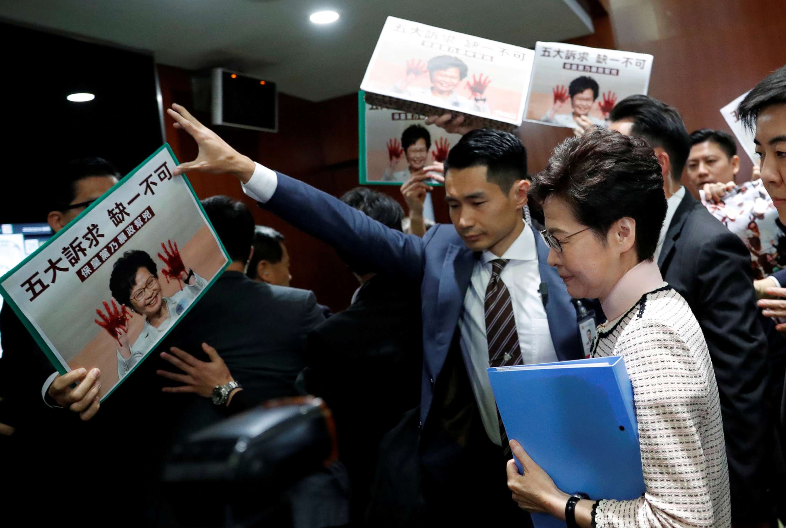 PHOTO: Hong Kong Chief Executive Carrie Lam arrives to deliver her annual policy address, as lawmakers shout protests, at the Legislative Council in Hong Kong, China, Oct. 16, 2019.