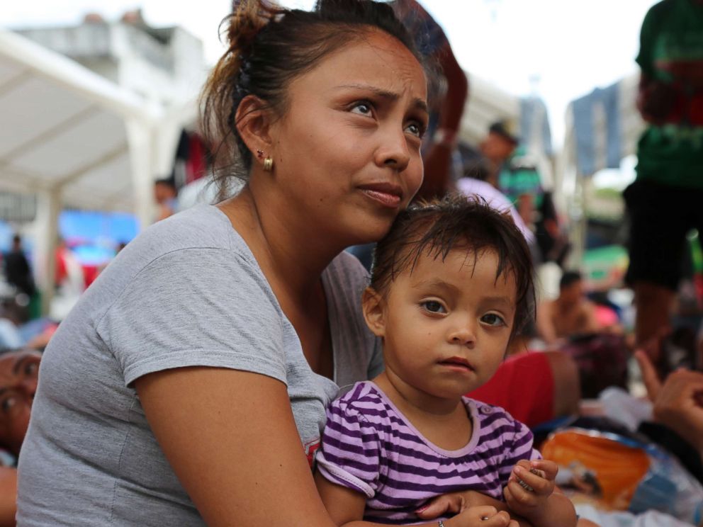 PHOTO: Maria Lucia Vigil Bardales holds her 2-year-old daughter, Meylin, but said she had to leave her 13-year-old behind.