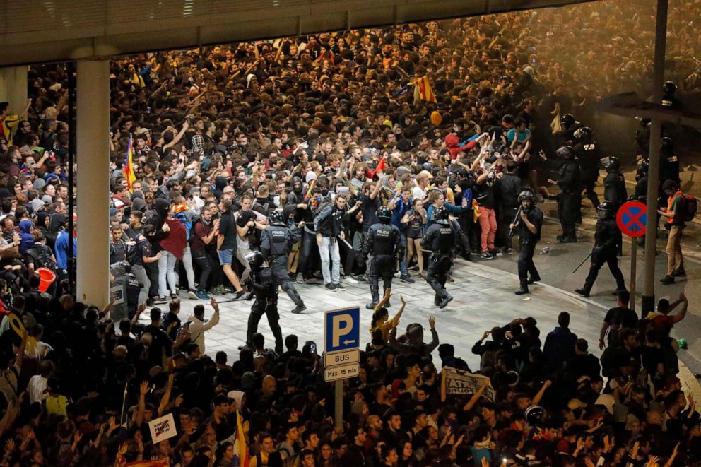 PHOTO: Protesters clash with Spanish policemen in Barcelona on Oct. 14, 2019, as thousands of angry protesters took to the streets after Spain's Supreme Court sentenced nine Catalan separatist leaders to between nine and 13 years in jail.