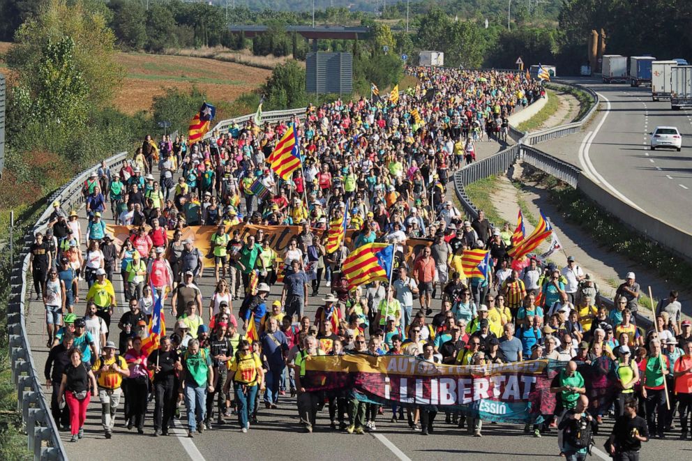 PHOTO: Demonstrators walk along a highway in Girona, Spain, Oct. 16, 2019. 