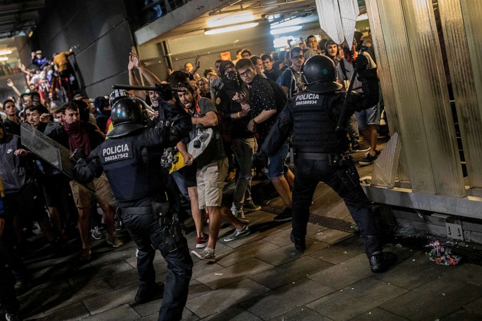 PHOTO: Police clash with demonstrators during a protest at El Prat airport, on the outskirts of Barcelona, Oct. 14, 2019.