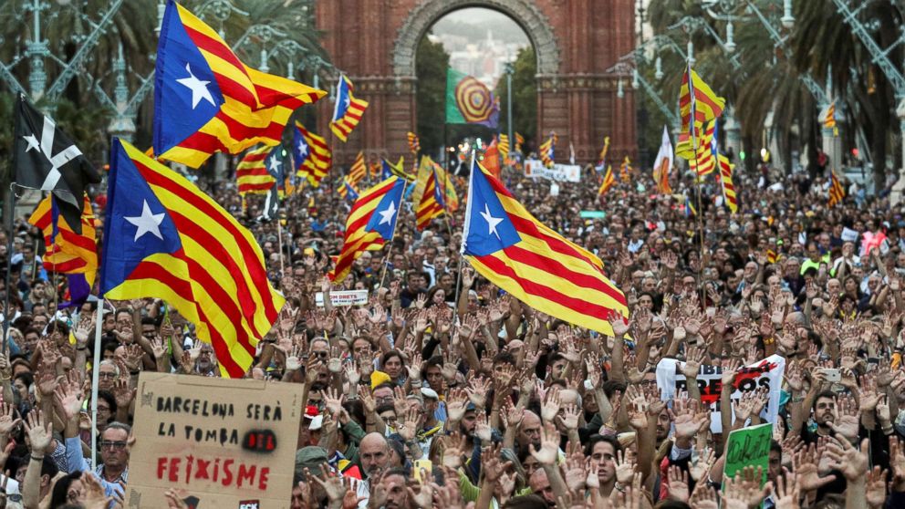 People attend a demonstration on the first anniversary of Catalonia's banned referendum on indpendence in Barcelona, Spain, Oct. 1, 2018.