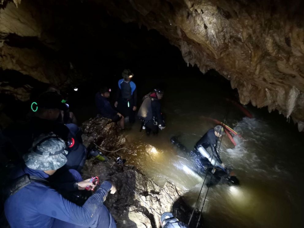 PHOTO: Divers work on a plan to rescue 12 boys and their soccer coach who remain trapped inside the Tham Luang Nang Non cave, Chiang Rai province, Thailand.