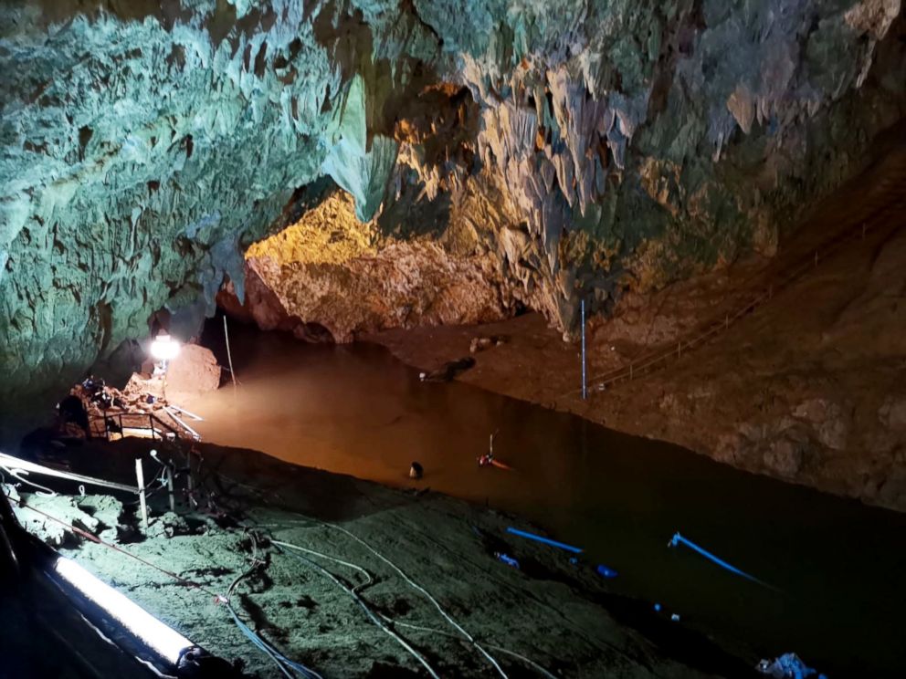 PHOTO: Divers work on a plan to rescue 12 boys and their soccer coach who remain trapped inside the Tham Luang Nang Non cave, Chiang Rai province, Thailand.