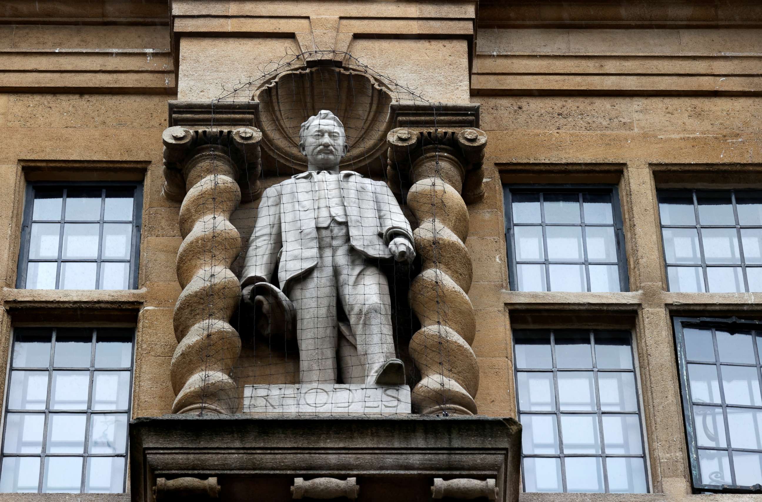 PHOTO: A statue of Cecil Rhodes, a 19th-century British colonialist, is seen outside the University of Oxford's Oriel College in Oxford, England, on June 18, 2020.