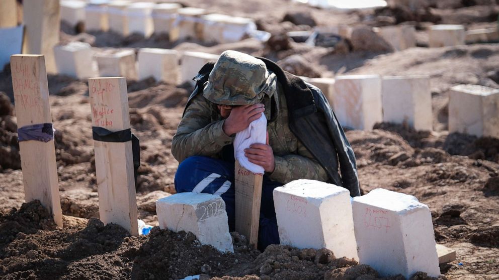 PHOTO: People mourn their relatives who lost their lives in the earthquake on Feb. 11, 2023 in Adiyaman, Turkey.