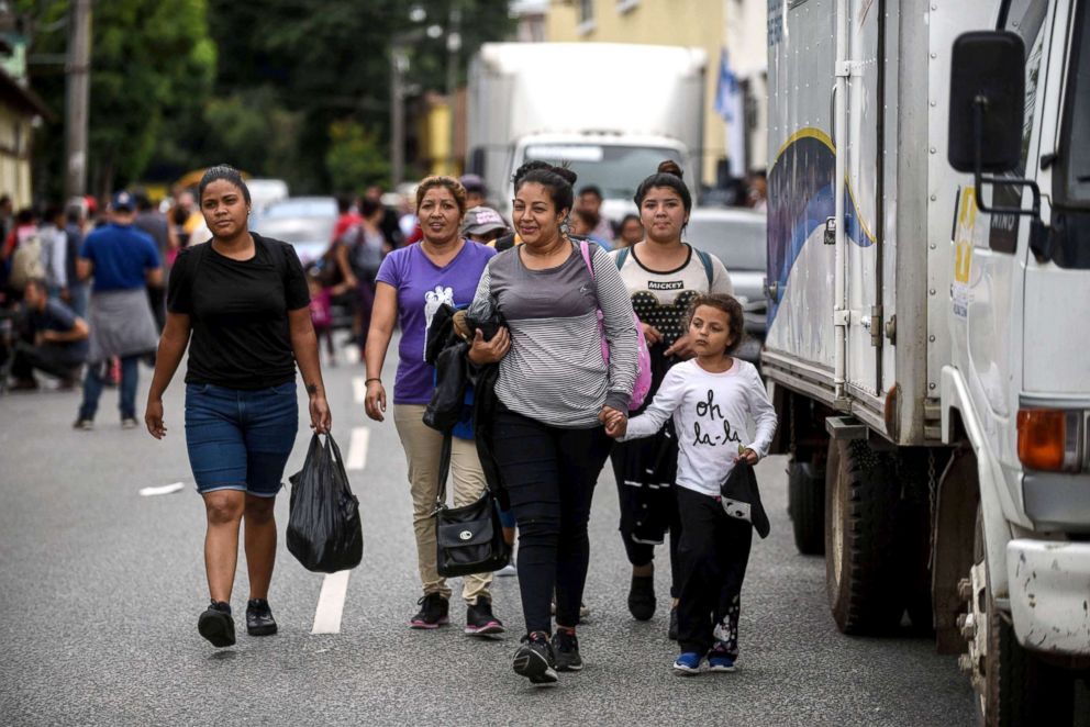 PHOTO: Honduran migrants taking part in a caravan towards the United States, leave the Casa del Migrante (Migrant's House) in Guatemala City, Oct. 17, 2018.