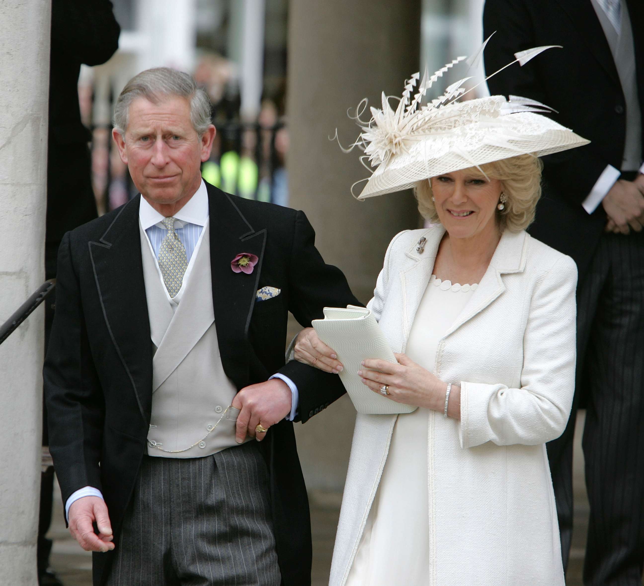 PHOTO: Prince Charles and his wife Camilla, the Duchess of Cornwall, depart the Civil Ceremony where they were legally married, at the Guildhall, Windsor on April 9, 2005 in Berkshire, England.