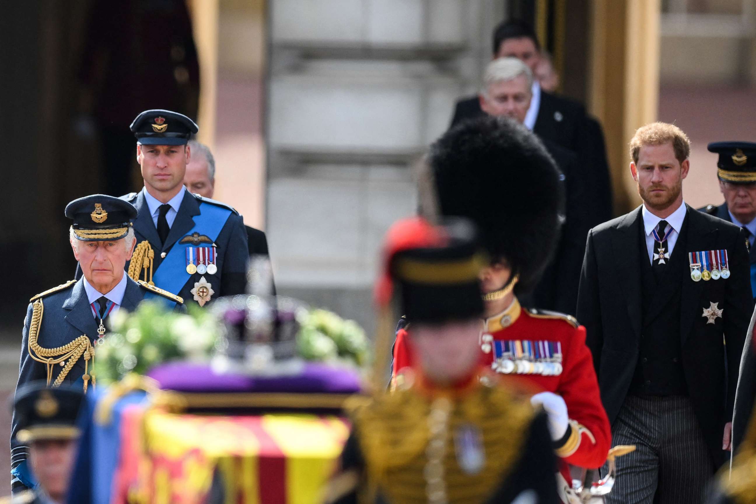 PHOTO: Britain's King Charles III, Britain's Prince William, Prince of Wales and Britain's Prince Harry, walk behind the coffin of Queen Elizabeth II, during a procession from Buckingham Palace to the Palace of Westminster, in London, Sept. 14, 2022. 