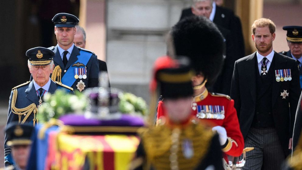 PHOTO: Britain's King Charles III, Britain's Prince William, Prince of Wales and Britain's Prince Harry, walk behind the coffin of Queen Elizabeth II, during a procession from Buckingham Palace to the Palace of Westminster, in London, Sept. 14, 2022. 