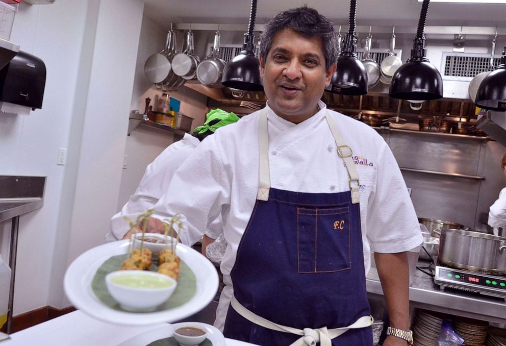 PHOTO: Chef Floyd Cardoz prepares food for a special event at Paowalla in New York, Oct. 13, 2016.