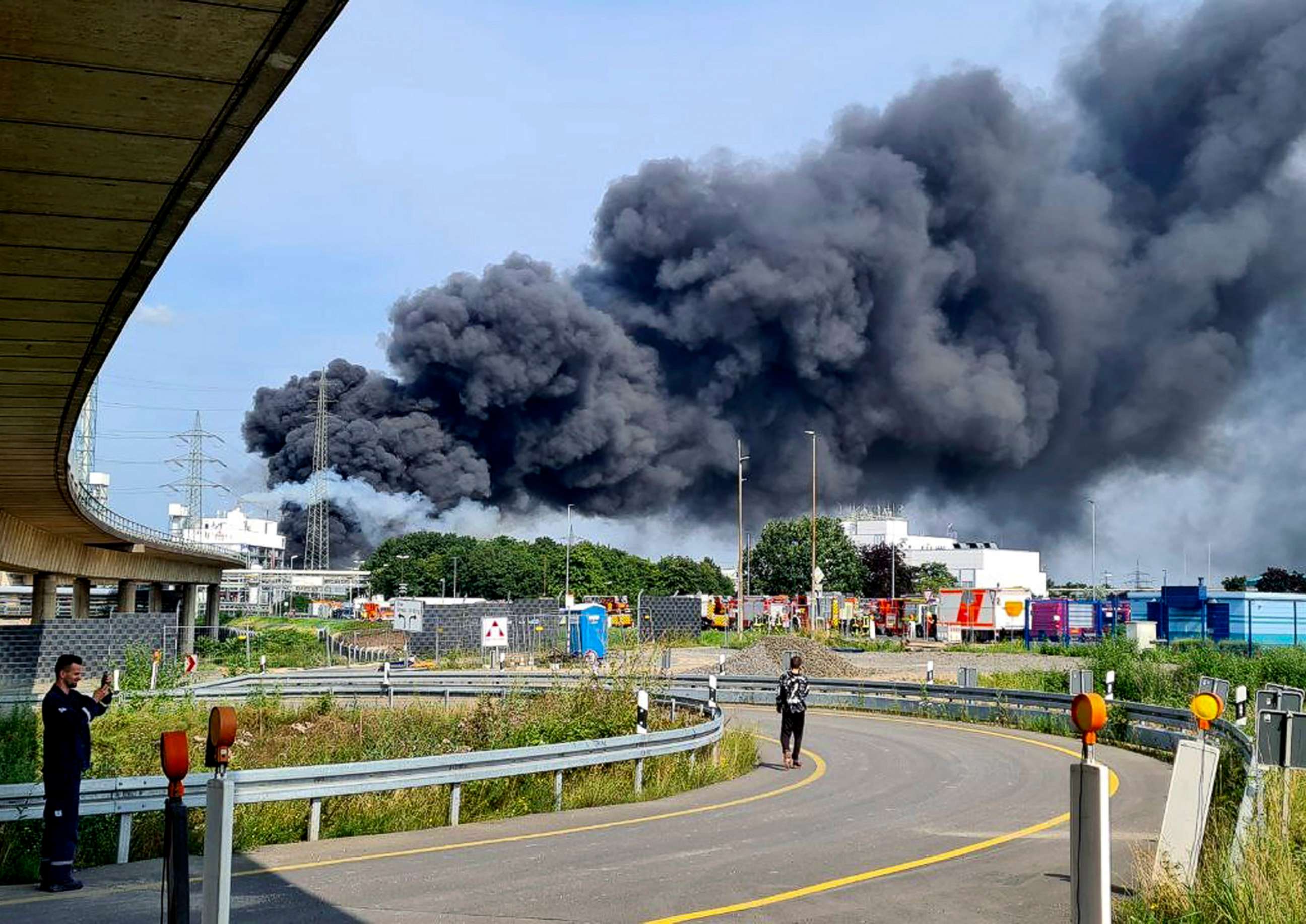 PHOTO: A dark cloud of smoke rises above the chemical park in Leverkusen, Germany, July 27, 2021.