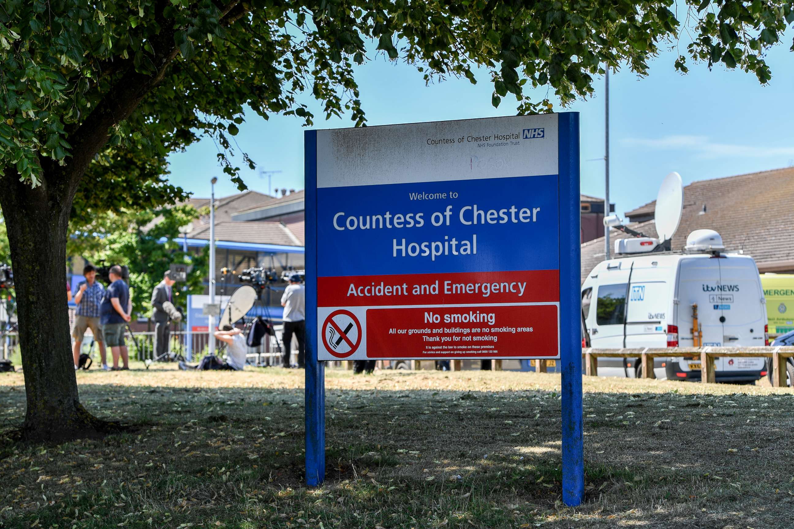 PHOTO: Media gather outside the Countess of Chester Hospital,July 3, 2018 in Chester, United Kingdom. A female health care worker at the Countess of Chester Hospital has been arrested on suspicion of murdering eight babies.  