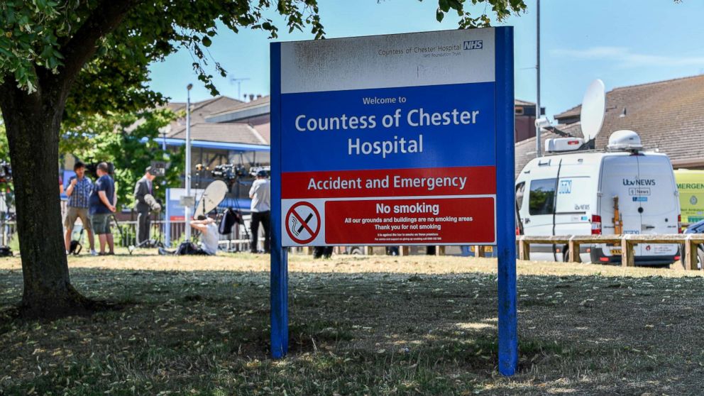 Media gather outside the Countess of Chester Hospital,July 3, 2018 in Chester, United Kingdom. A female health care worker at the Countess of Chester Hospital has been arrested on suspicion of murdering eight babies.