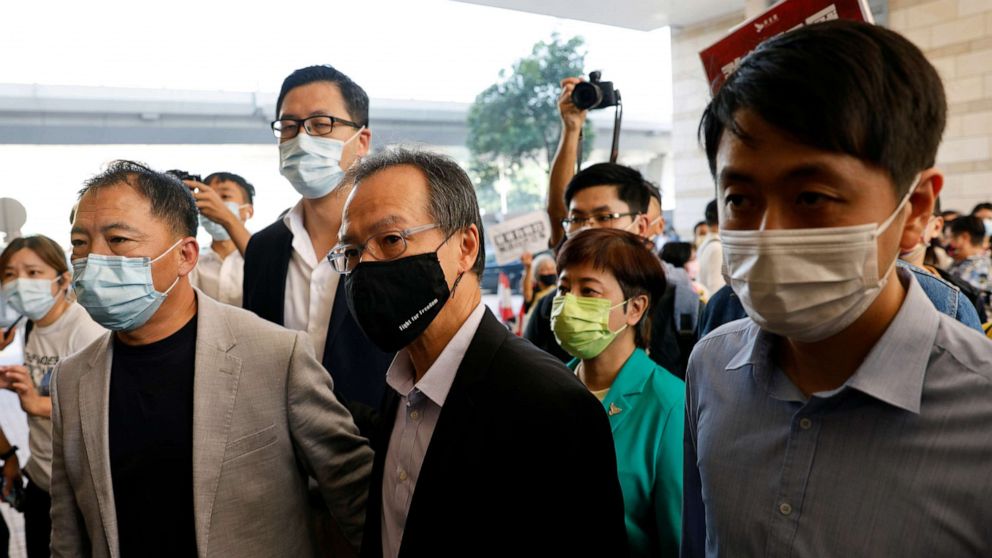 PHOTO: Left to right, pro-democracy activists Wu Chi-wai, Lam Cheuk-ting, Fernando Cheung Chiu-hung, Helena Wong Pik-wan and Ted Hui Chi-fung arrive at West Kowloon Magistrates's Courts in Hong Kong, Nov. 6, 2020.
