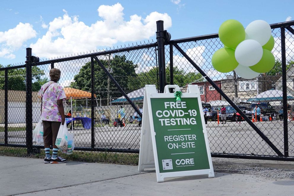 PHOTO: A sign alerts residents to a mobile COVID-19 testing site set up on a vacant lot in the Austin neighborhood of Chicago, June 23, 2020. The site is one of four mobile testing sites set up by the city.