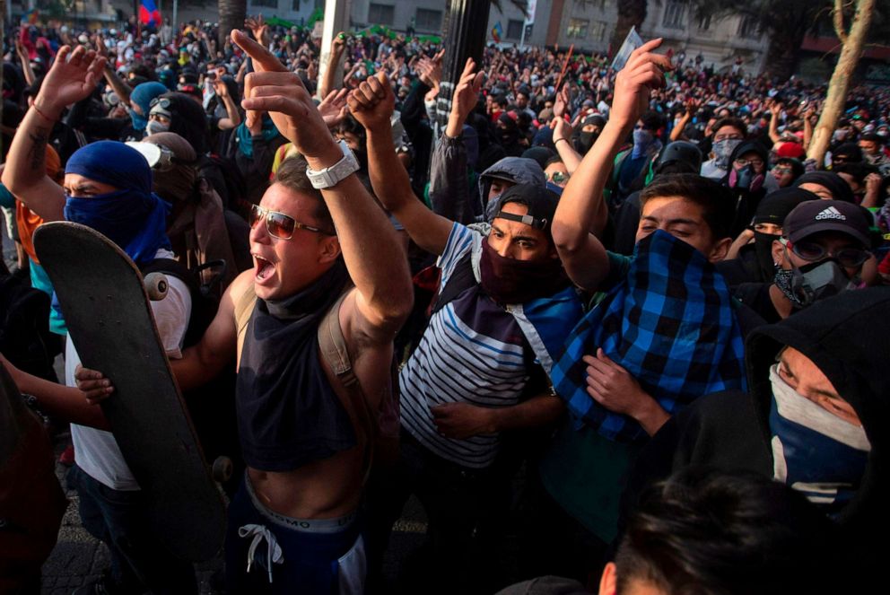 PHOTO:Demonstrators clash with riot police during protests in Santiago, Oct. 29, 2019. 