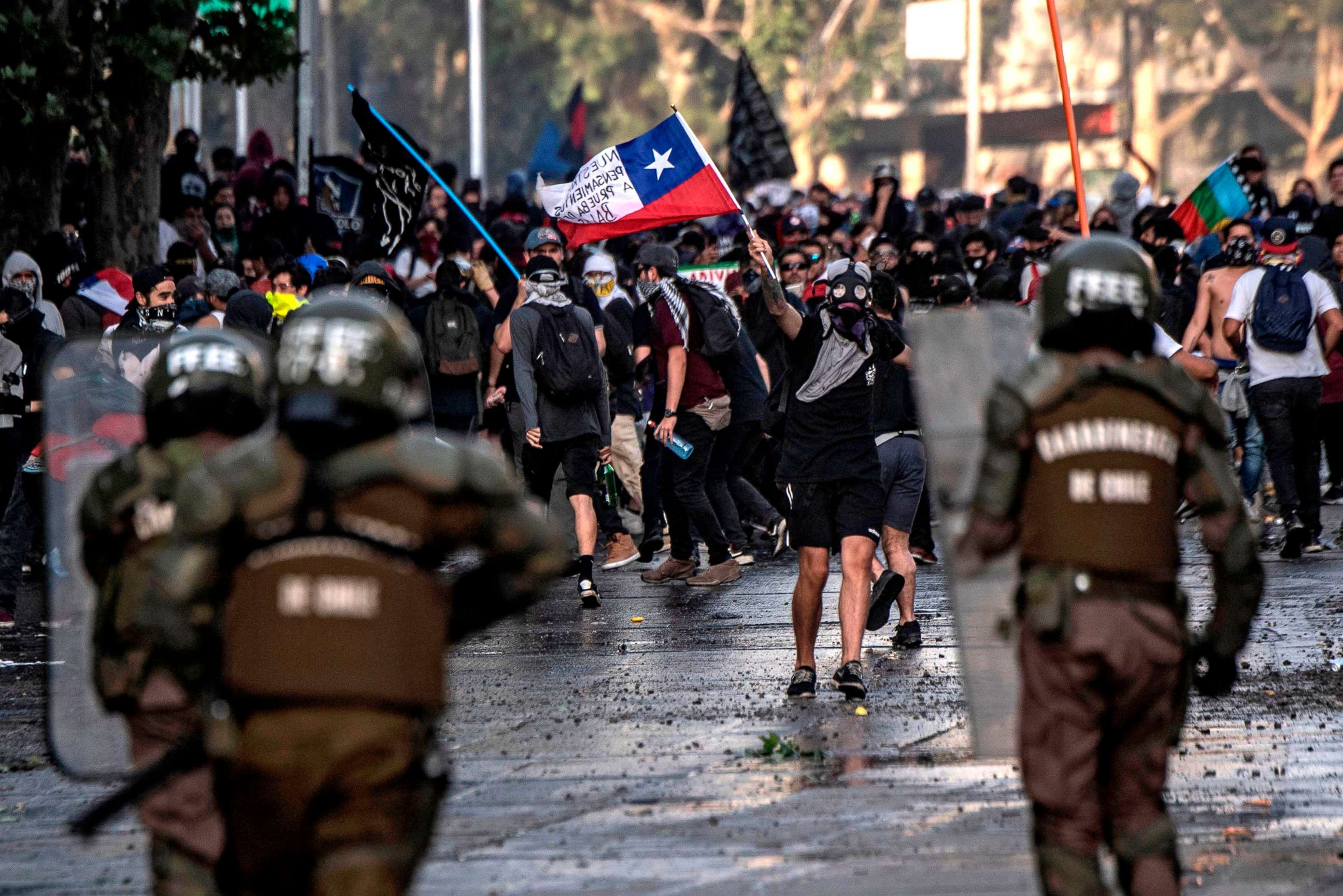 PHOTO:Demonstrators clash with riot police during protests in Santiago, Oct. 29, 2019.