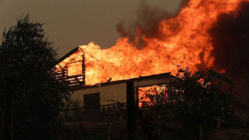PHOTO: A residence is seen on fire in Santa Juana, near Concepcion, Chile, Feb. 3, 2023.
